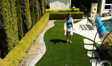 Synthetic grass around a swimming pool in Novato, California