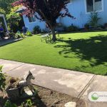Artificial grass playground in backyard