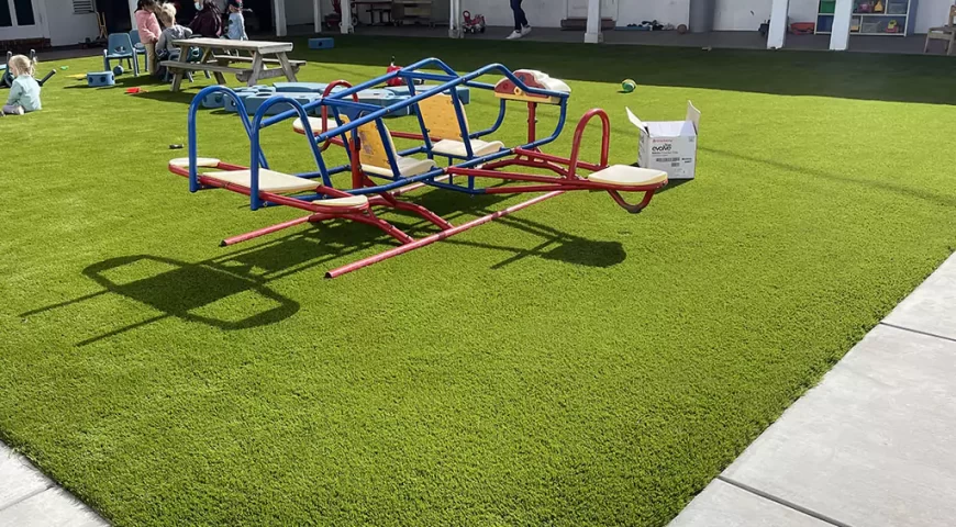 Artificial Grass: Taking Playground Safety, Fun, and Comfort to New Heights